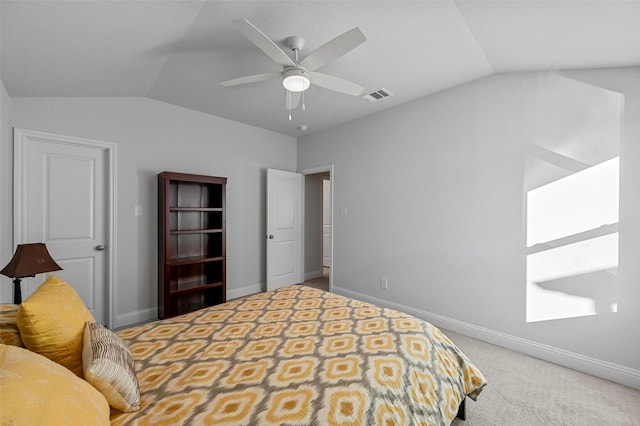 carpeted bedroom with lofted ceiling and ceiling fan