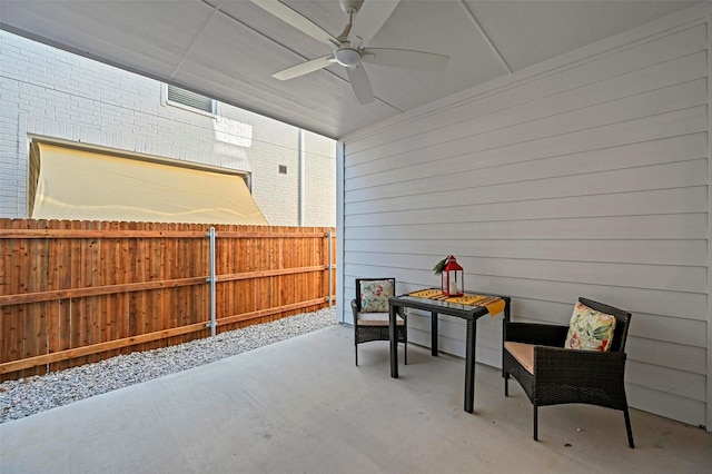 view of patio featuring ceiling fan