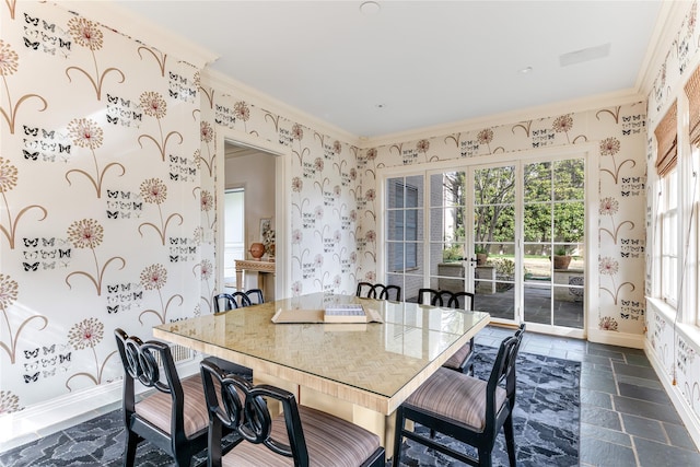 dining space featuring ornamental molding