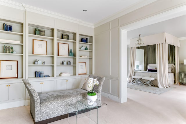 living area with crown molding, an inviting chandelier, and light carpet