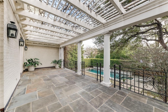 view of patio with a fenced in pool and a pergola