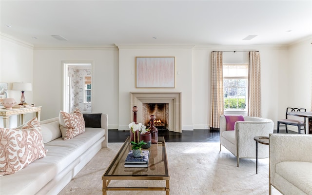 living room with ornamental molding and hardwood / wood-style floors