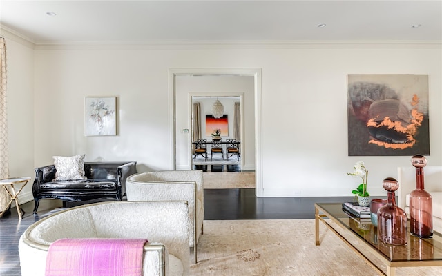 living room featuring ornamental molding and hardwood / wood-style floors