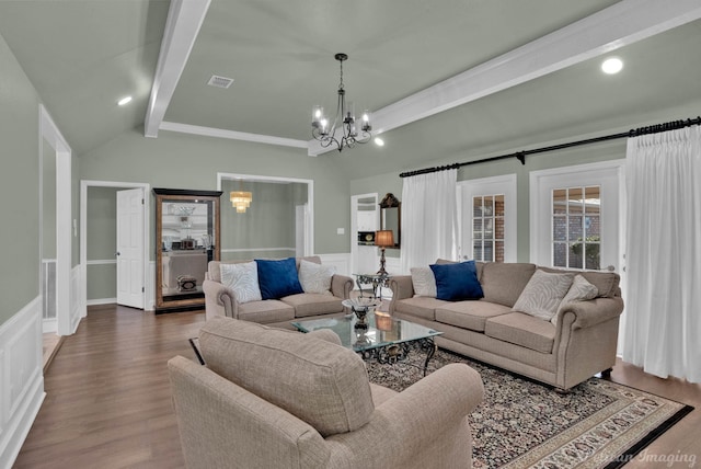173 Southwood Dr, Bossier City, LA 71111 - living room with beamed ceiling, a chandelier, and hardwood / wood-style floors