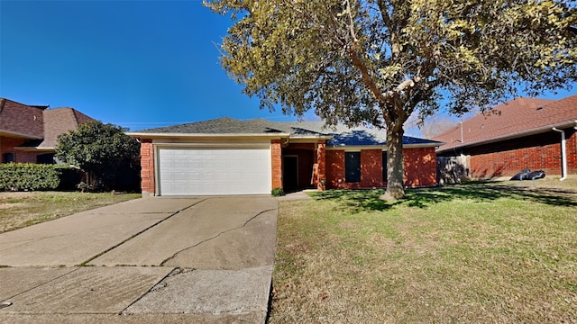 ranch-style home with a garage and a front lawn