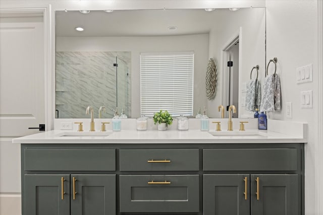 bathroom featuring vanity and a shower with shower door