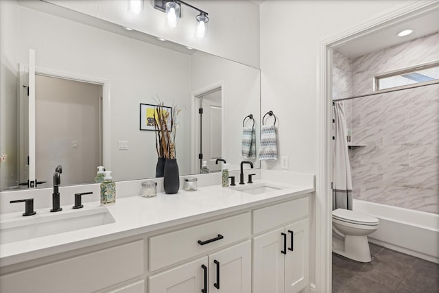 full bathroom with shower / bathtub combination with curtain, vanity, and toilet