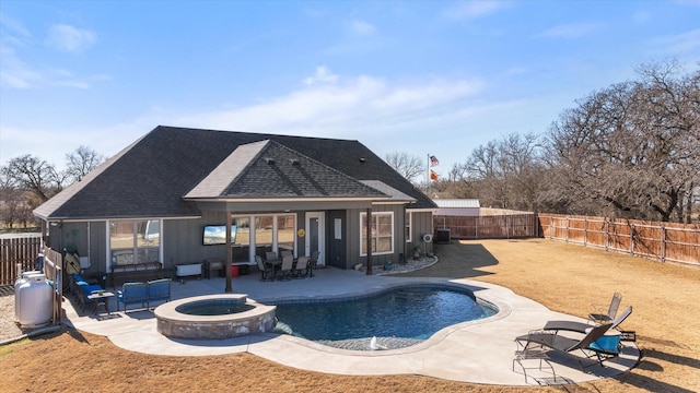 view of pool featuring an in ground hot tub and a patio area