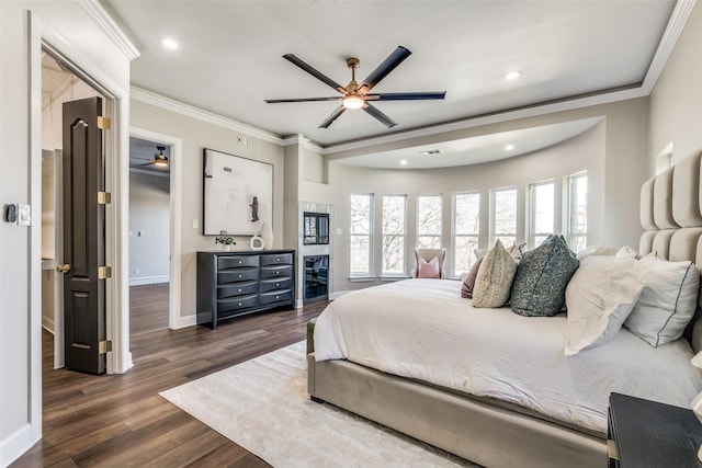 bedroom featuring crown molding, ceiling fan, and dark hardwood / wood-style floors