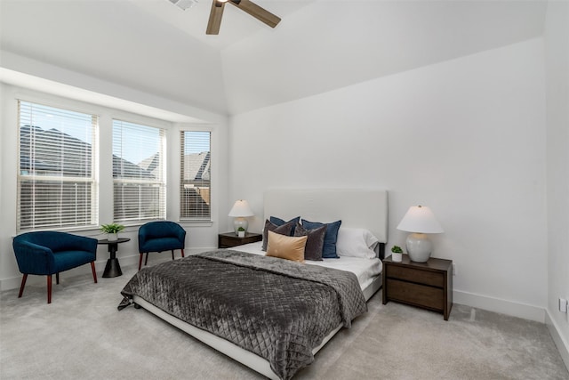 bedroom featuring baseboards, ceiling fan, lofted ceiling, and light colored carpet