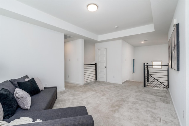 bedroom featuring light carpet, baseboards, visible vents, and vaulted ceiling