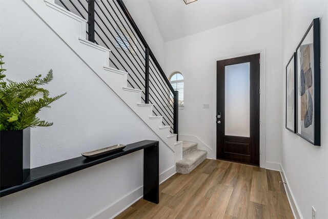 doorway to property featuring a garage