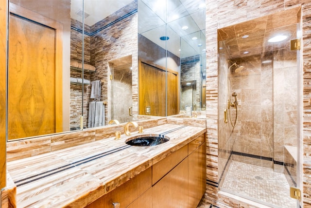 bathroom featuring vanity and walk in shower