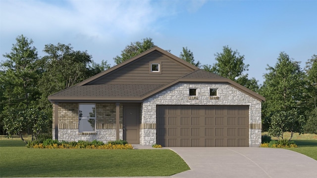 view of front of home featuring a garage and a front yard