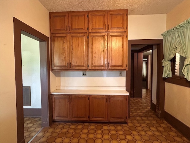 kitchen with a textured ceiling