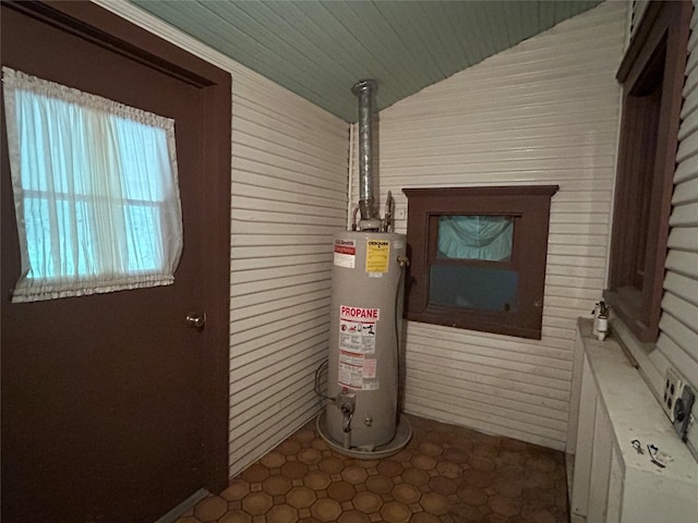 utility room with water heater