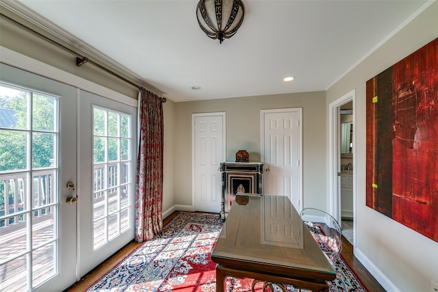 home office featuring hardwood / wood-style floors and french doors