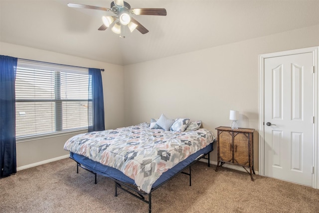 carpeted bedroom with lofted ceiling and ceiling fan