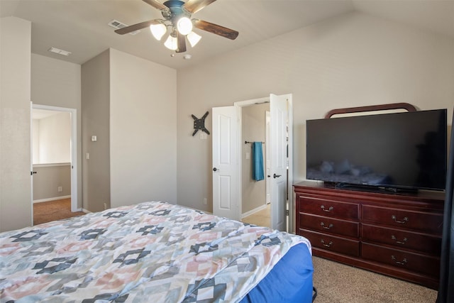 carpeted bedroom featuring lofted ceiling and ceiling fan