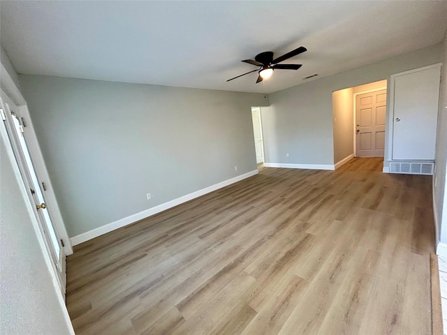 unfurnished bedroom featuring ceiling fan and light hardwood / wood-style floors