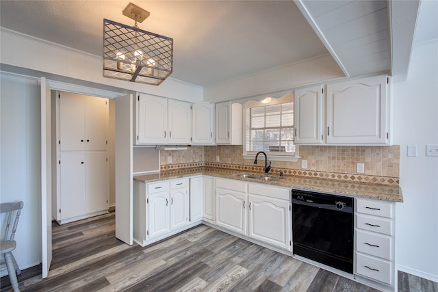 kitchen featuring white cabinets, backsplash, sink, and black dishwasher