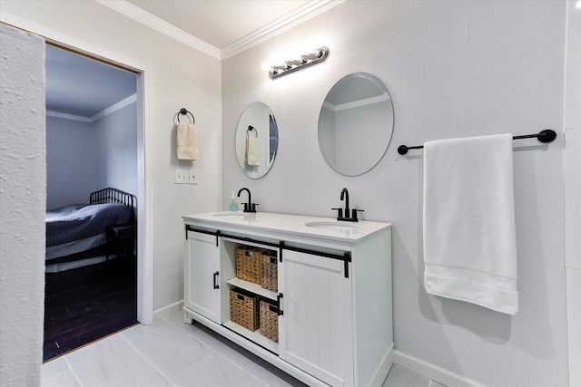 bathroom featuring vanity, tile patterned floors, and ornamental molding