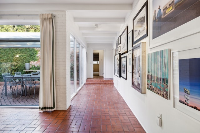 hallway with beamed ceiling