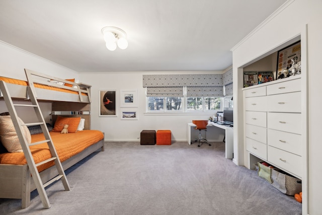 bedroom featuring crown molding and carpet flooring