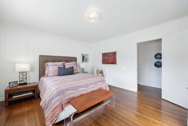 bedroom with wood finished floors