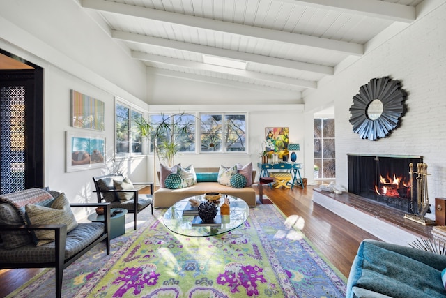 sunroom featuring vaulted ceiling with beams