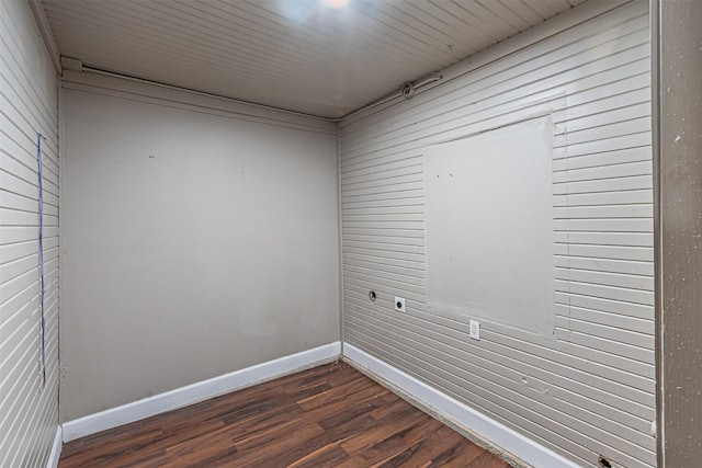 empty room featuring dark hardwood / wood-style flooring