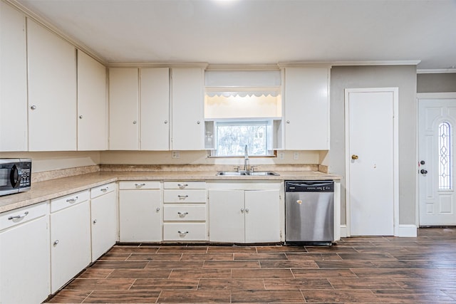 kitchen featuring white cabinetry, appliances with stainless steel finishes, and sink