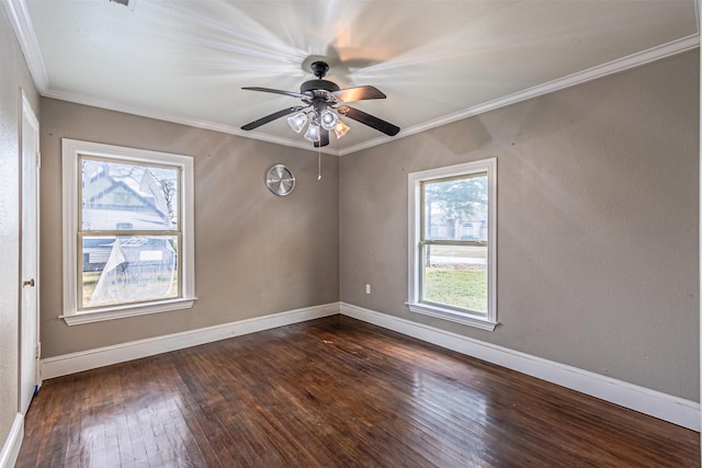 spare room featuring ceiling fan, ornamental molding, and dark hardwood / wood-style floors