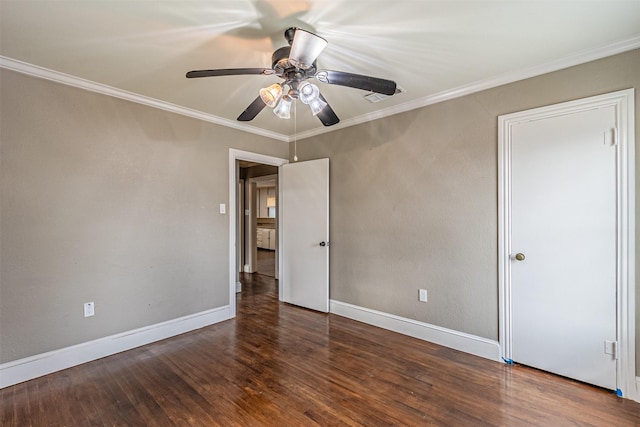 spare room with crown molding, hardwood / wood-style floors, and ceiling fan