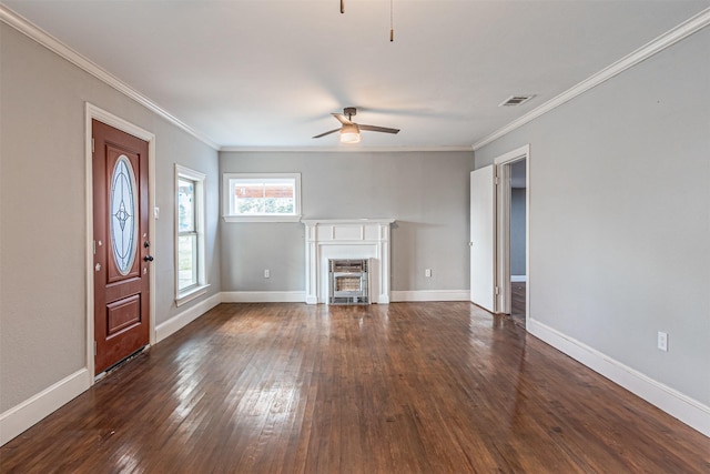 unfurnished living room with ornamental molding, dark hardwood / wood-style floors, and ceiling fan