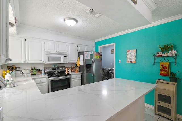 kitchen featuring washing machine and clothes dryer, white cabinetry, crown molding, kitchen peninsula, and stainless steel appliances