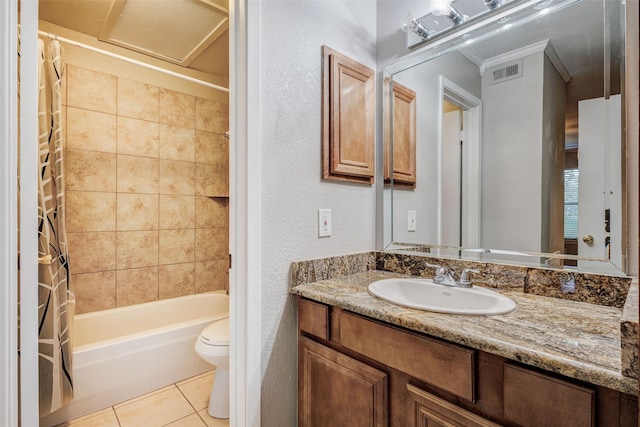 full bathroom with tile patterned floors, toilet, crown molding, shower / tub combo, and vanity