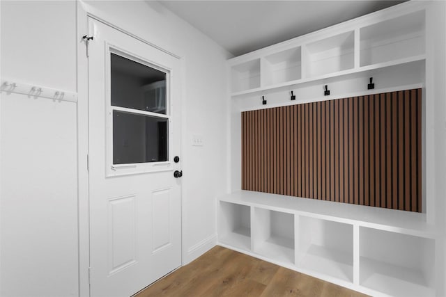 mudroom with wood finished floors