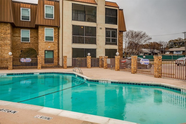 view of pool with a patio area