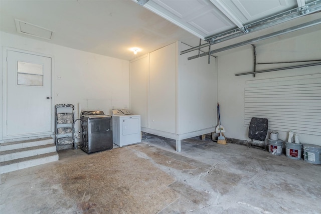 garage with independent washer and dryer