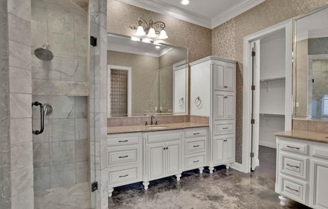 bathroom featuring crown molding, vanity, and walk in shower