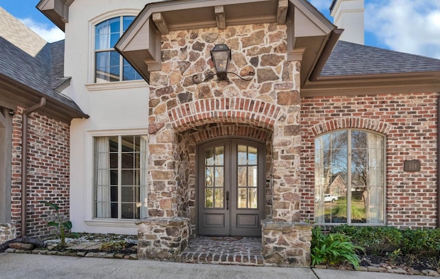 doorway to property featuring french doors