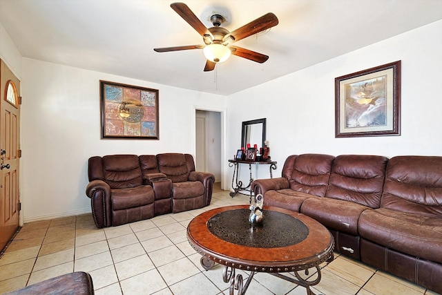 living room featuring light tile patterned flooring and ceiling fan