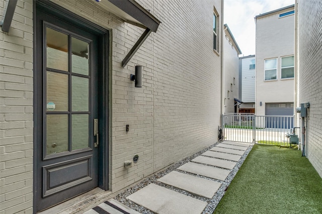 view of side of home featuring a garage