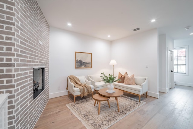 living room with light hardwood / wood-style floors