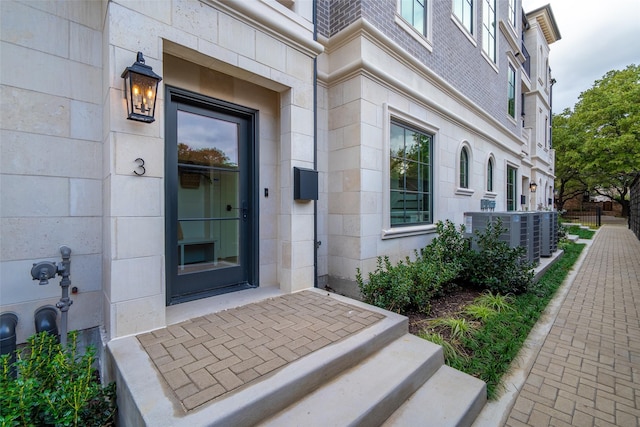 entrance to property with central AC unit