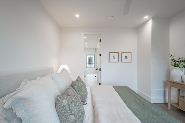 bedroom featuring wood-type flooring