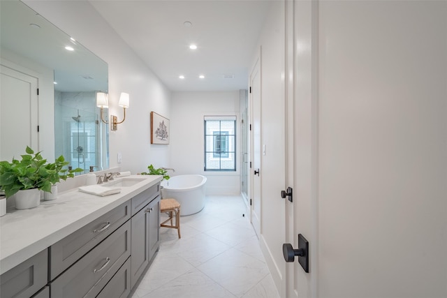 bathroom featuring independent shower and bath and vanity