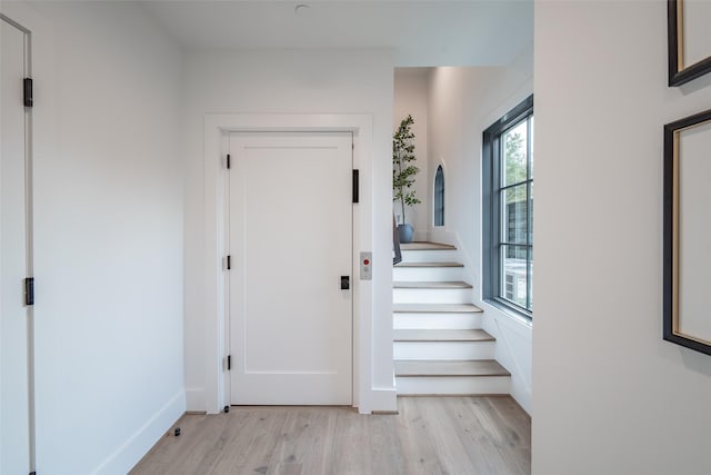 entrance foyer featuring light hardwood / wood-style floors