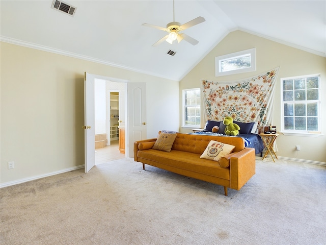 carpeted living room featuring crown molding, ceiling fan, and lofted ceiling